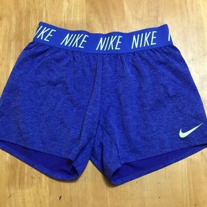 Almost new blue and green Nike trophy shorts girls